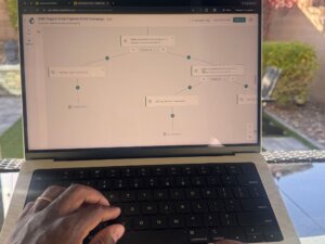 Email marketing strategy displayed on a laptop with MailChimp workflow